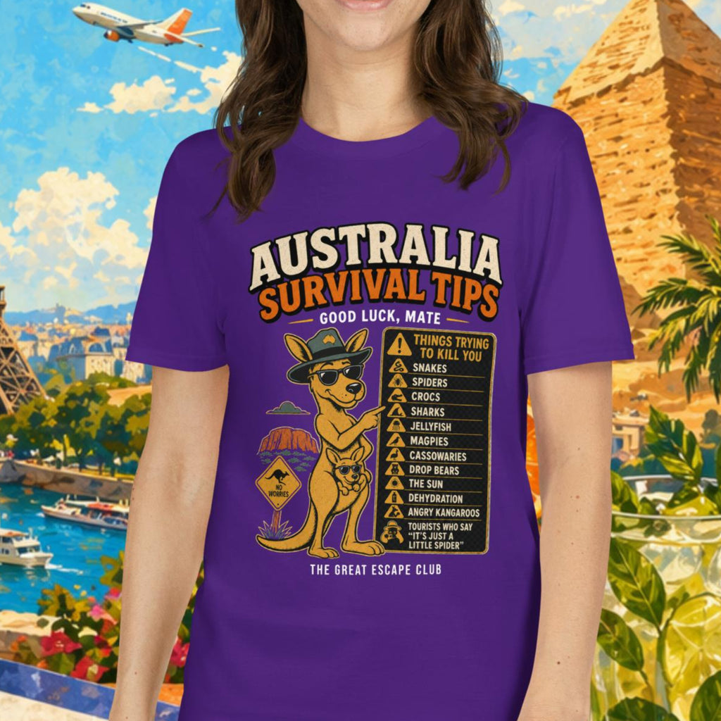 Woman wearing a purple t-shirt with 'Australia Survival Tips' design, set against a colorful travel-themed background.