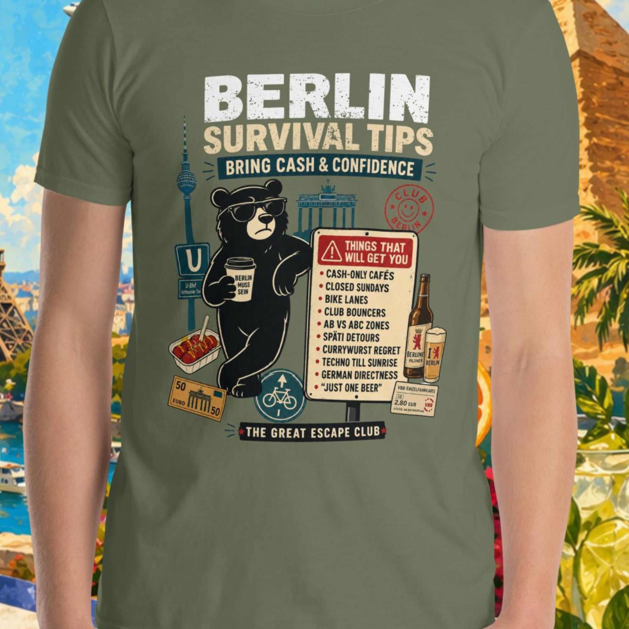 Person wearing a green t-shirt with 'Berlin Survival Tips' design in front of a colorful background with landmarks.