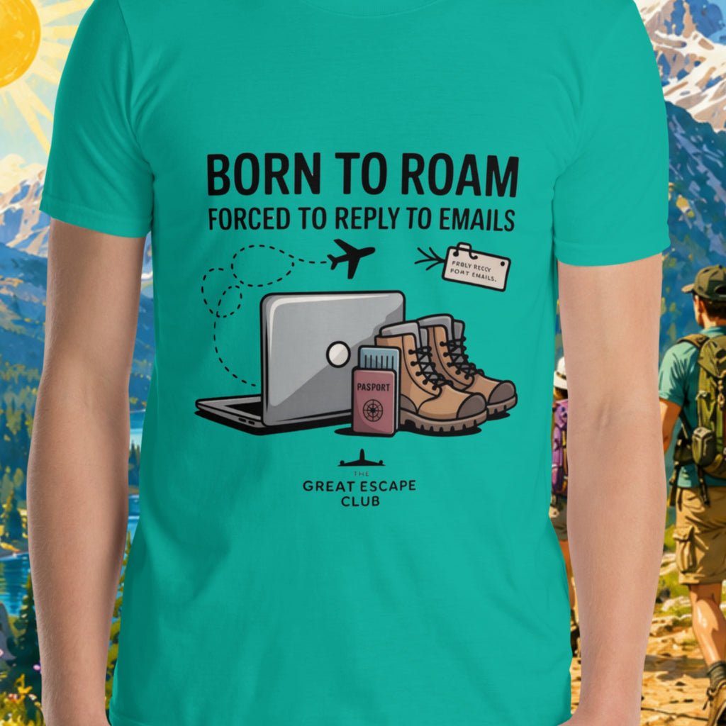 Born to Roam Forced to Reply to Emails unisex jade green T-shirt with laptop, hiking boots, passport and airplane travel design
