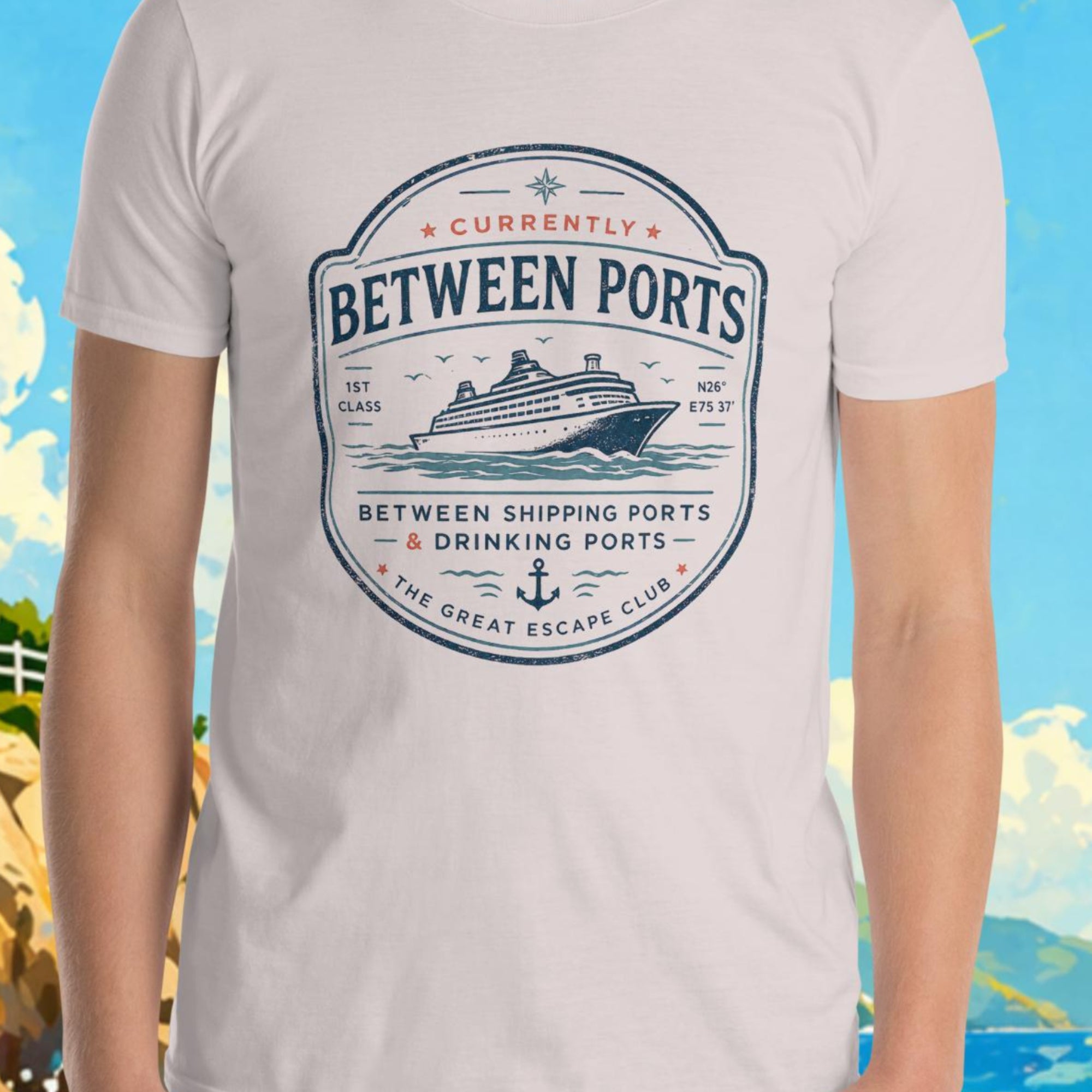 Person wearing a t-shirt with 'Between Ports' design in front of a scenic background with lighthouse and sailboat.
