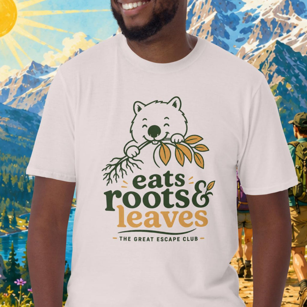 Man wearing a t-shirt with a bear graphic and text in a scenic outdoor setting