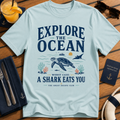 Explore The Ocean Shark Eats You funny shark ocean t-shirt design on Light Blue shirt