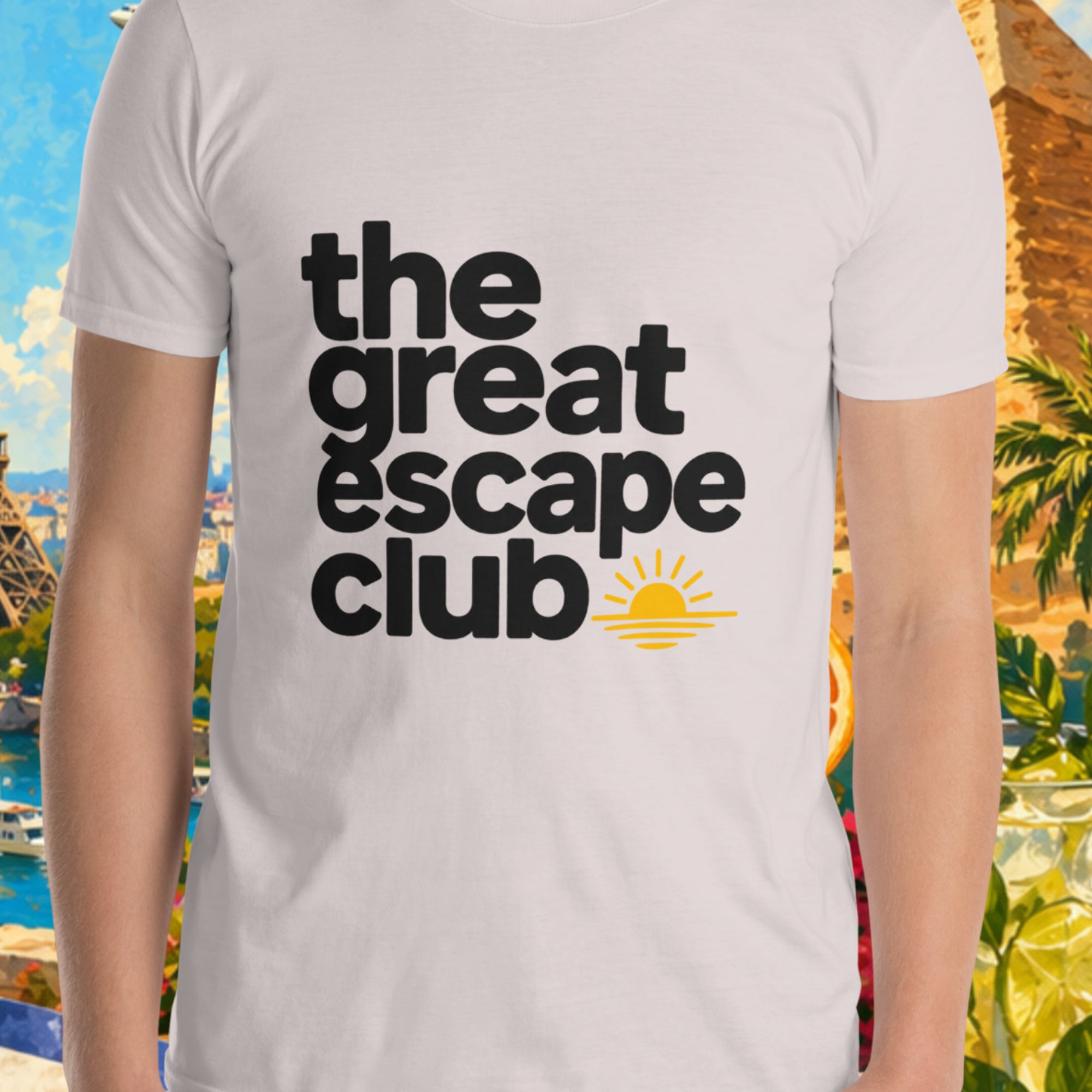Person wearing a 'the great escape club' t-shirt with a scenic background