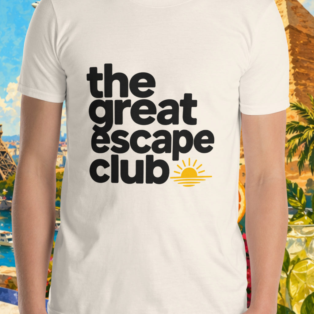 Person wearing a 'the great escape club' t-shirt with a scenic background