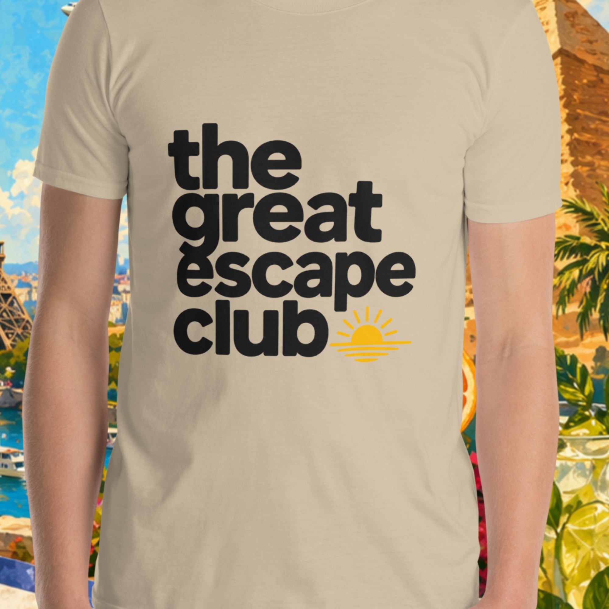 Person wearing a 'the great escape club' t-shirt with a scenic background