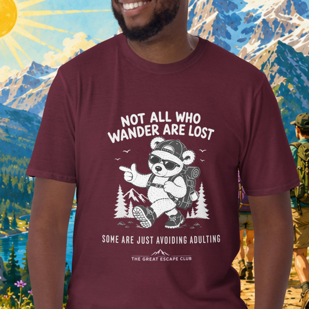 Not All Who Wander Are Lost Some Are Just Avoiding Adulting unisex maroon T-shirt featuring a funny hiking bear with backpack, cap and sunglasses