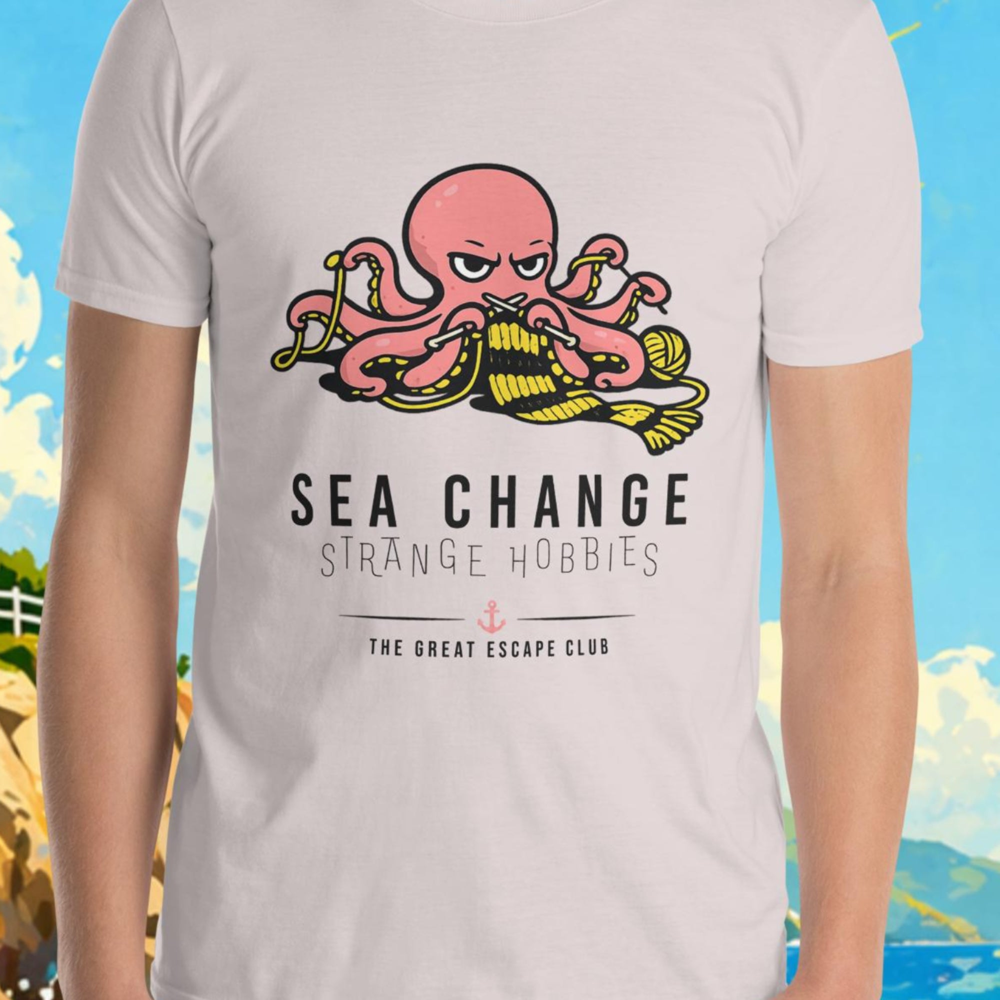 Person wearing a t-shirt with an octopus design and text, set against a scenic background with a lighthouse and boat.