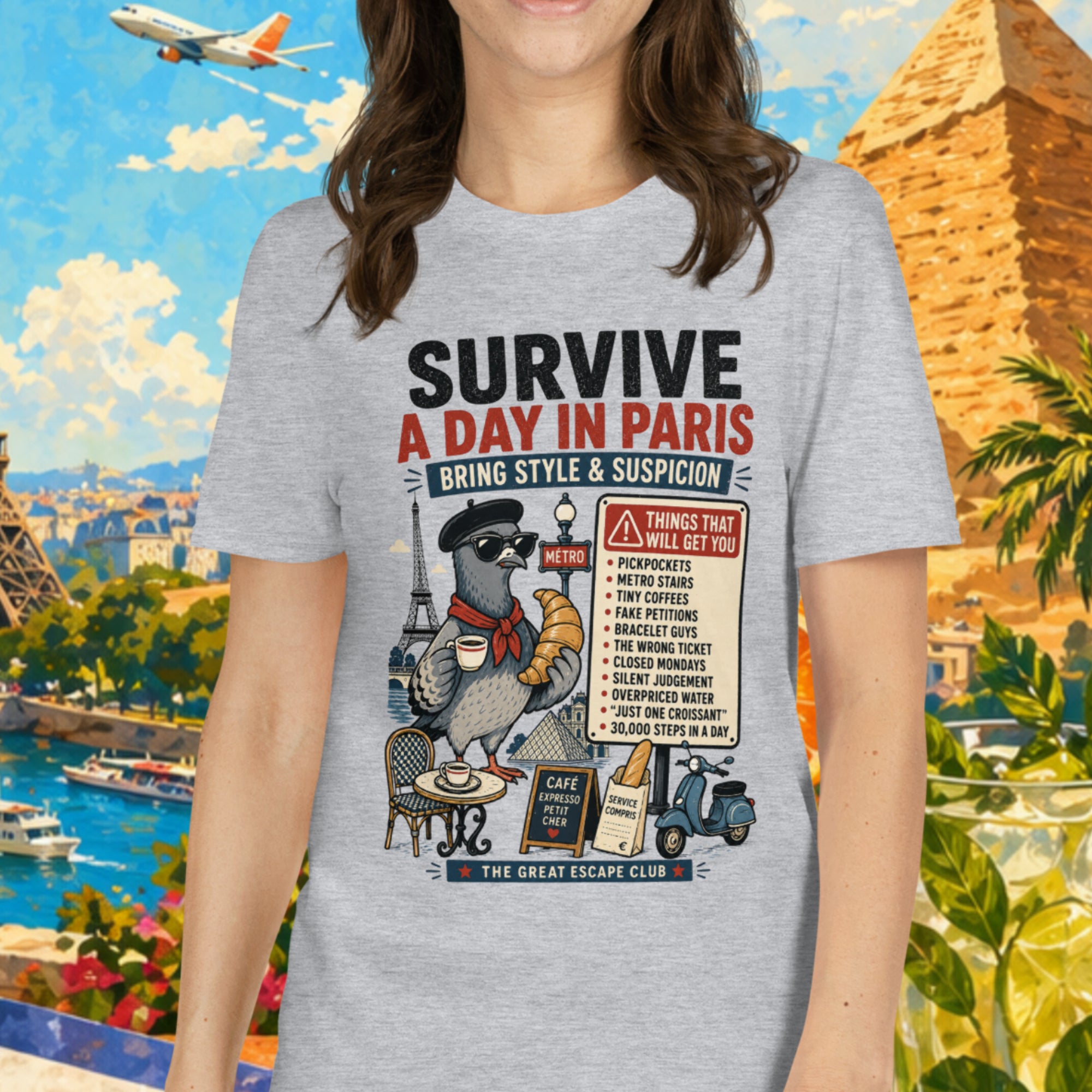 Person wearing a t-shirt with a graphic design in front of a colorful background with landmarks and tropical elements.