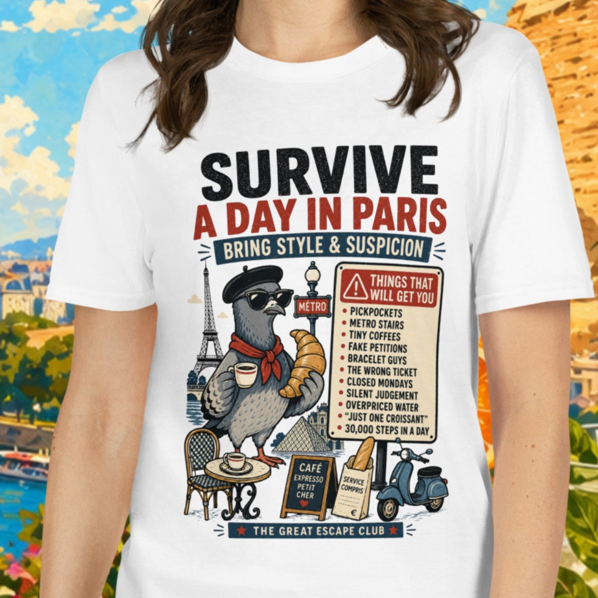 Woman wearing a t-shirt with a graphic design in front of a colorful background with Eiffel Tower and pyramids.