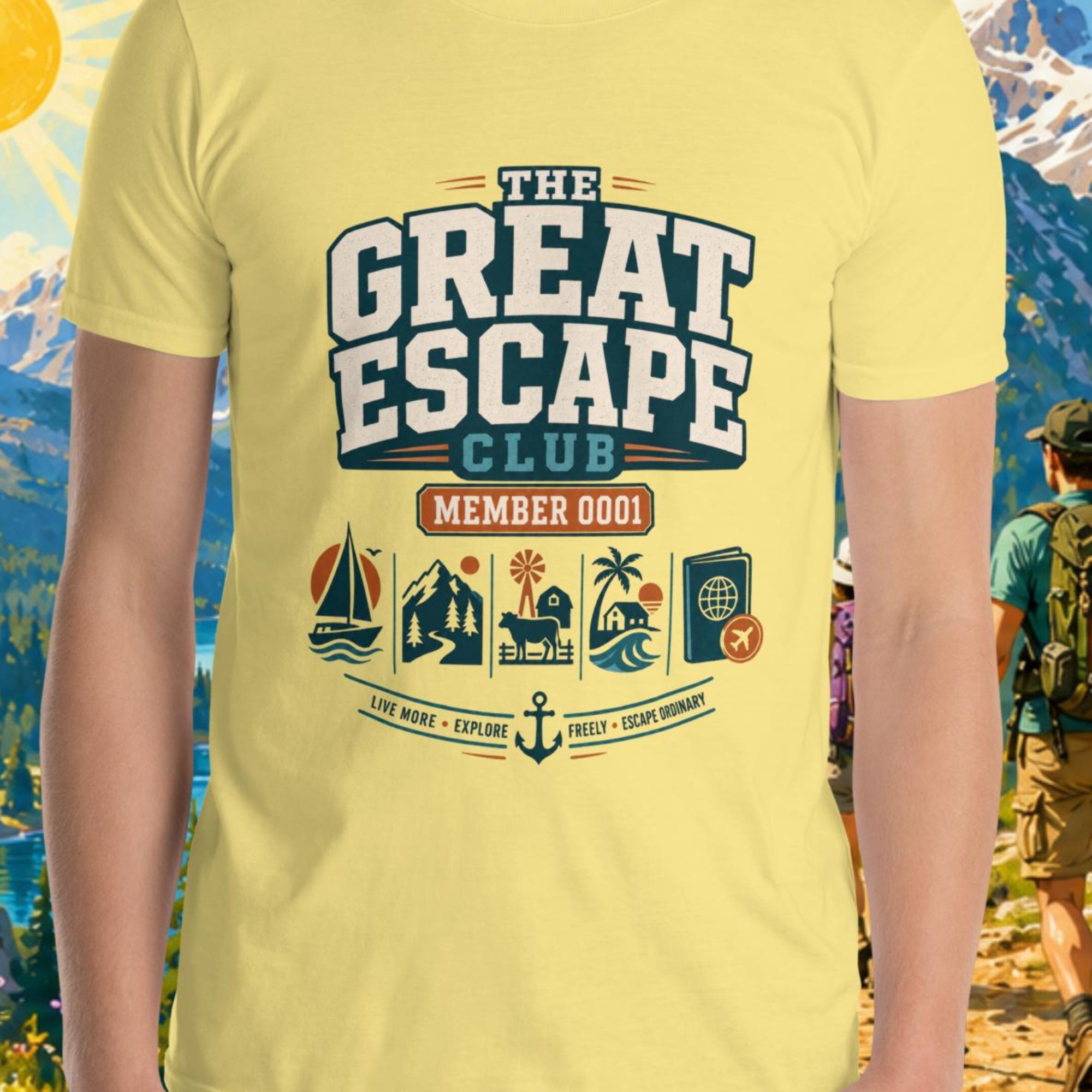 Person wearing a yellow t-shirt with 'The Great Escape Club' design against a mountainous landscape.