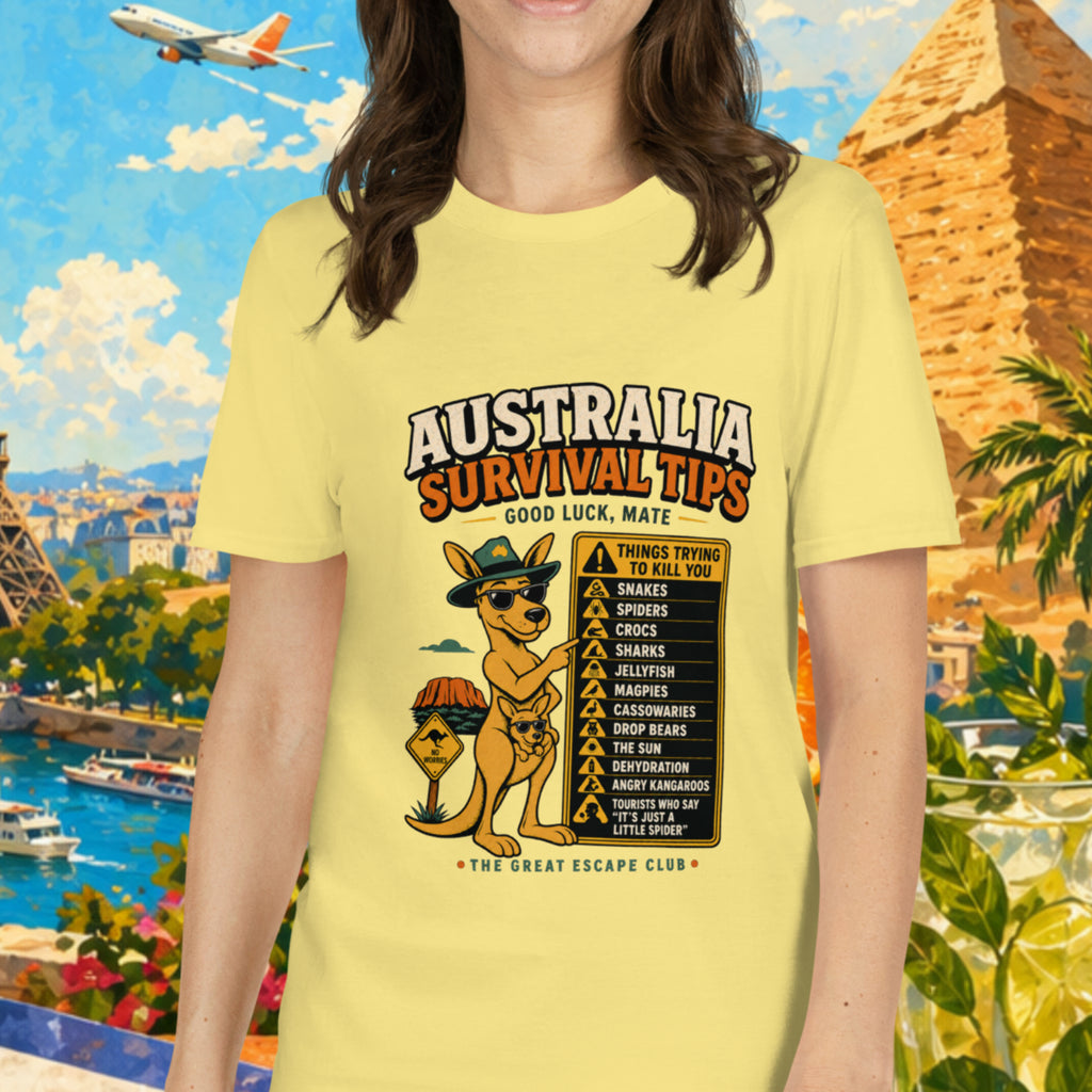 Woman wearing a yellow t-shirt with a travel-themed design in front of a colorful background with landmarks and nature.