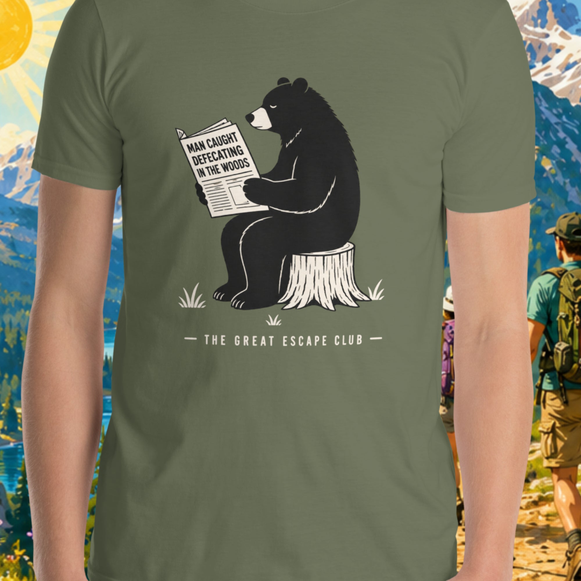 Person wearing a green t-shirt with a bear reading a newspaper graphic and 'The Great Escape Club' text.