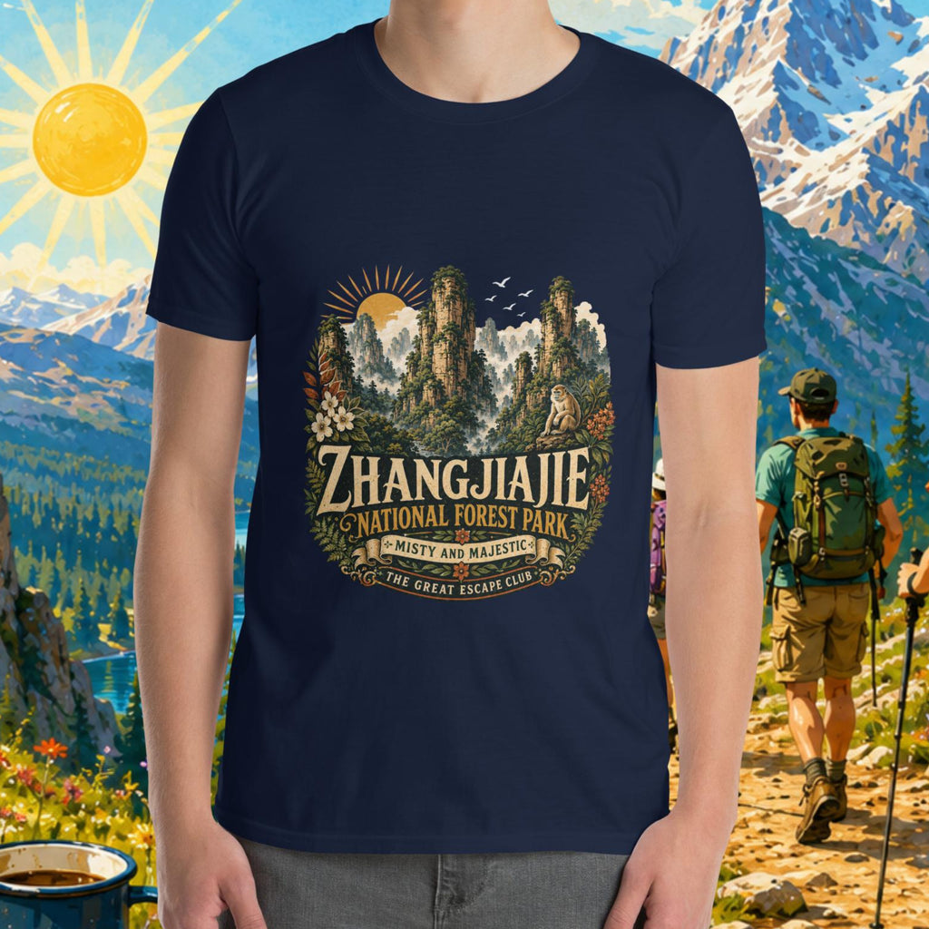 Person wearing a navy blue t-shirt with Zhangjiajie National Forest Park design, standing in front of a scenic mountain backdrop.