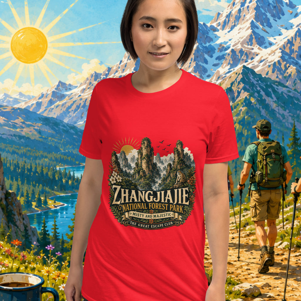 Person wearing a red t-shirt with Zhangjiajie National Forest Park design, standing in front of a scenic mountain backdrop.