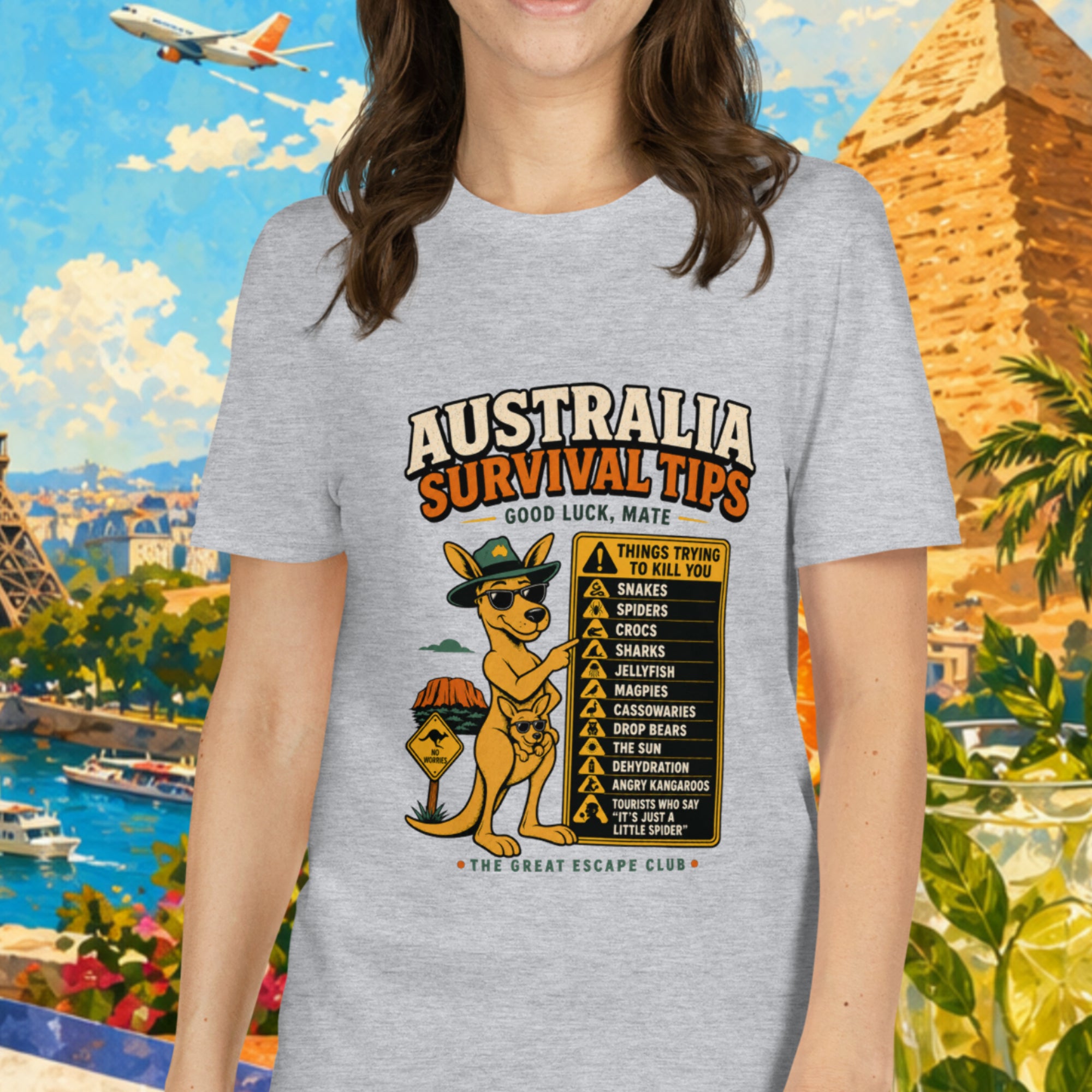 Person wearing a t-shirt with 'Australia Survival Tips' design in front of travel-themed collage