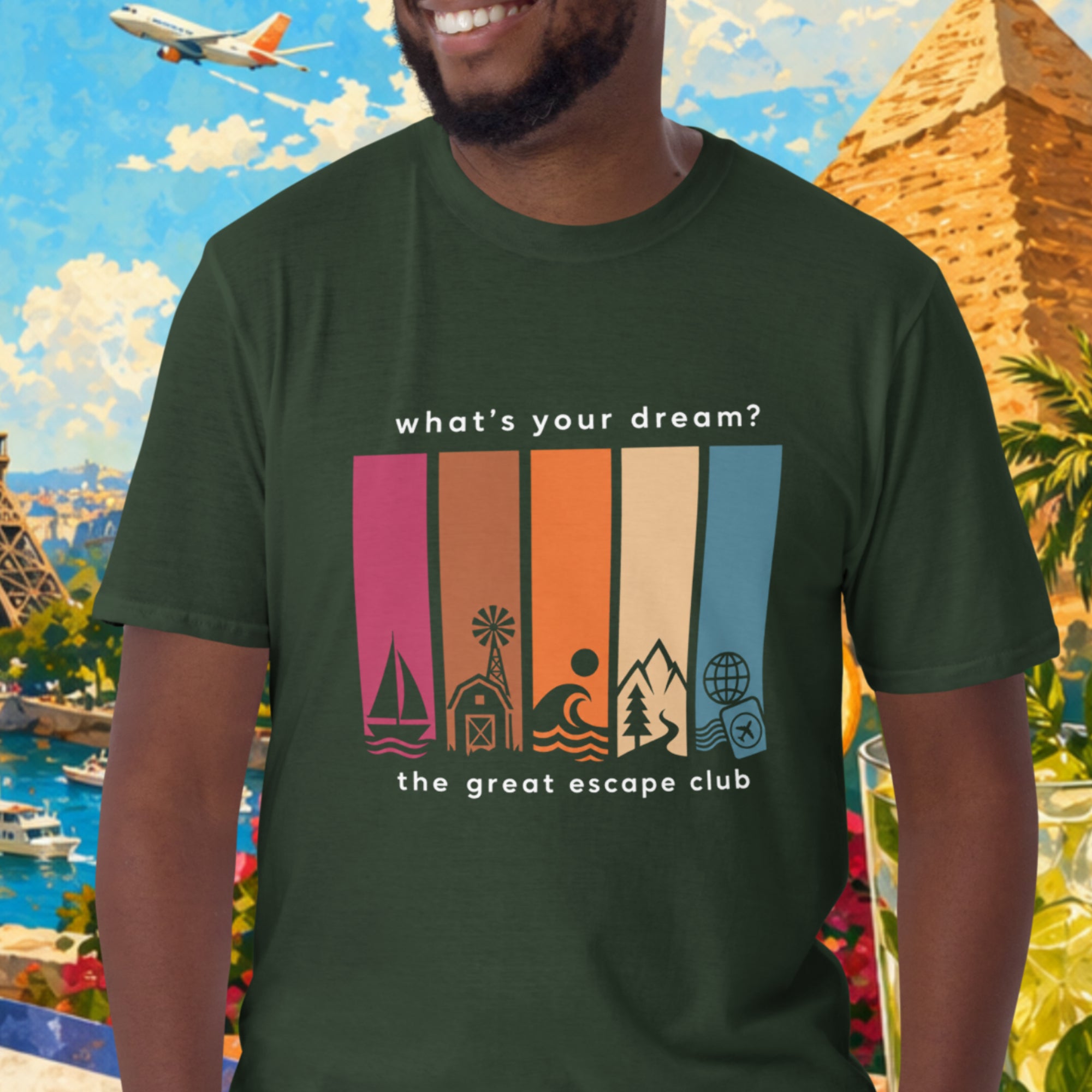 Man wearing a t-shirt with a travel-themed design in front of a colorful background with landmarks and nature.